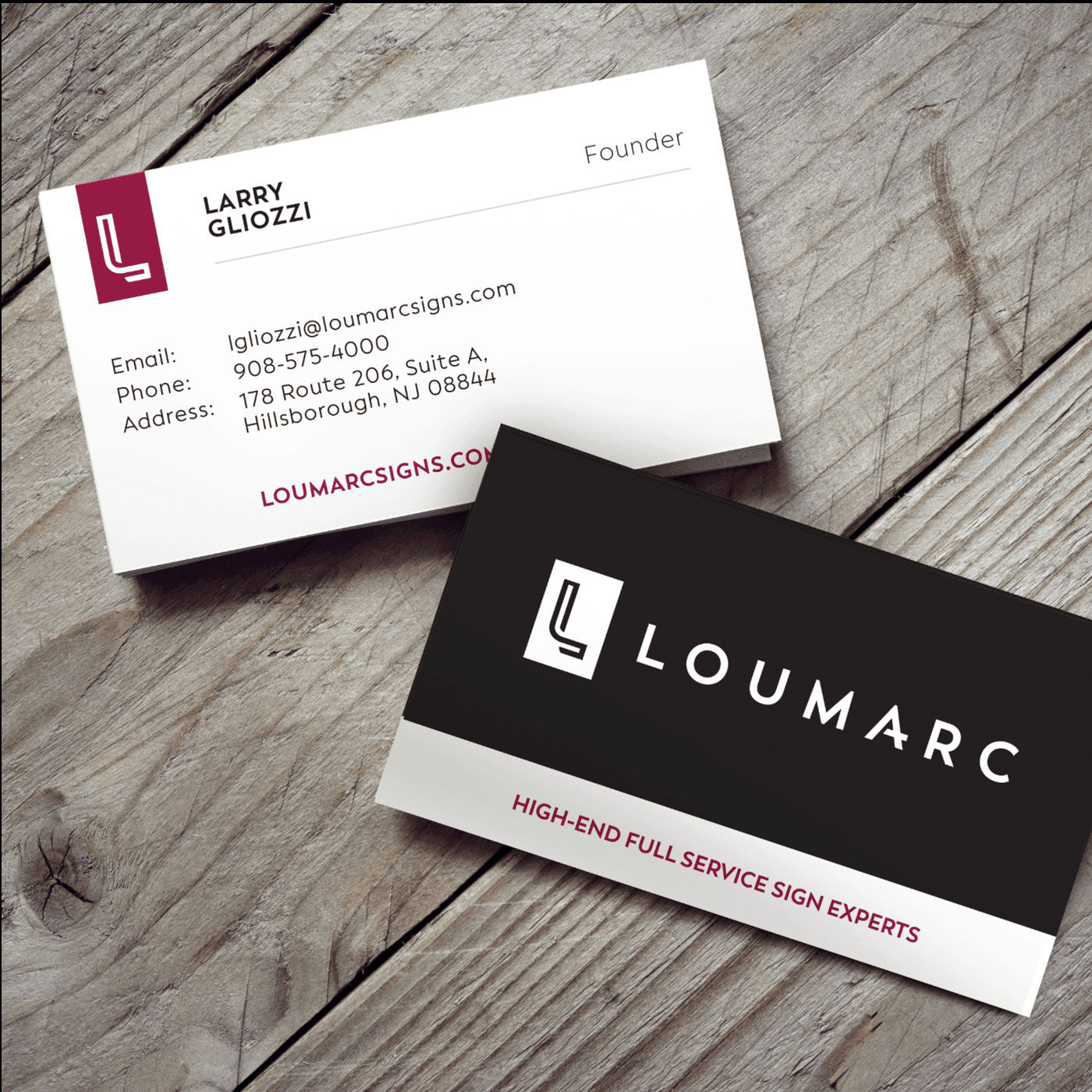 Mock up of the Loumarc Signs business cards